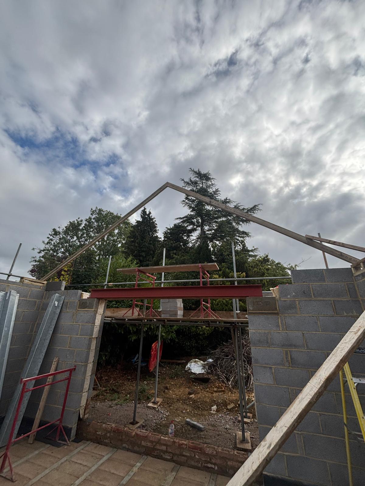 Structural steel beam and roof framing on an extension